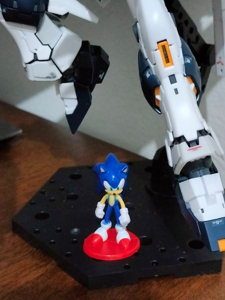 A photo depicting a mini figurine of John Sonic, that I got from a Kinder joy knockoff 