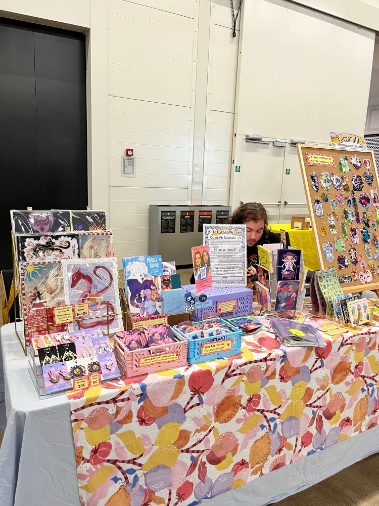 A photo of an artist alley table 