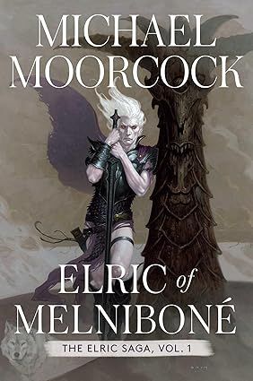The cover of Michael Moorcock's Elric of Melnibone. A thin, pale man with wild white hair drifting in the wind, clad in black armor ad clutching a black sword as tall as himself, leans against a screaming totem.