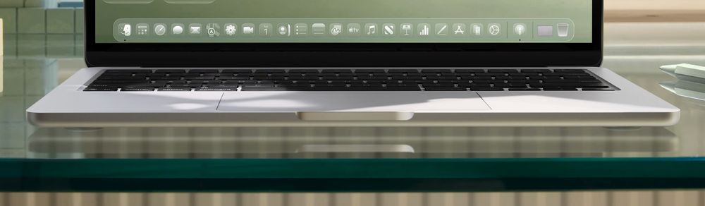 The translucent style of Dock on macOS Tahoe.