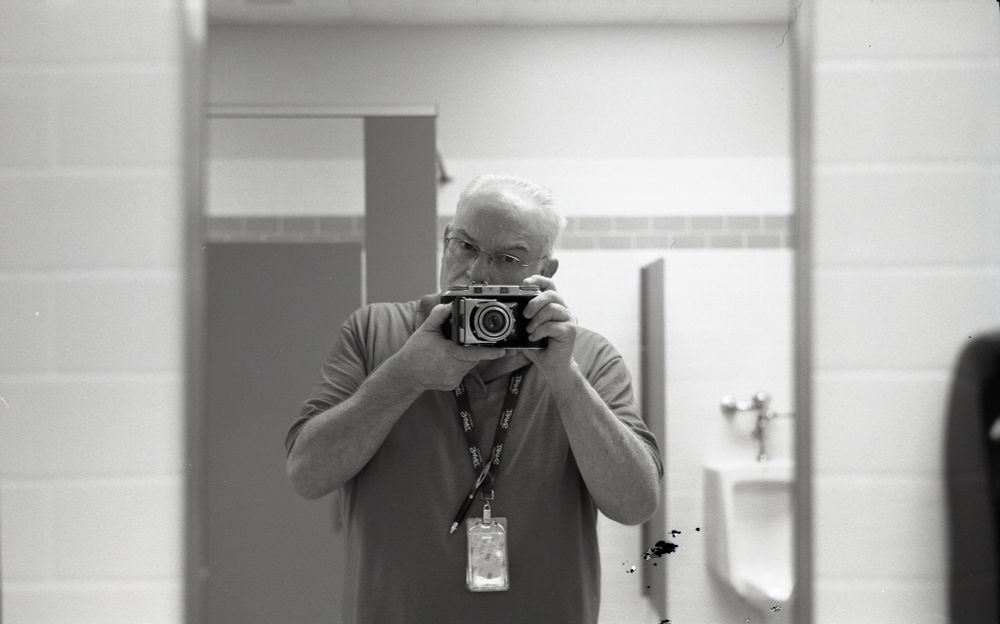 Test shot from a Voigtlander Bessa II - obligatory mirror selfie, required with test roll of any new film camera. 