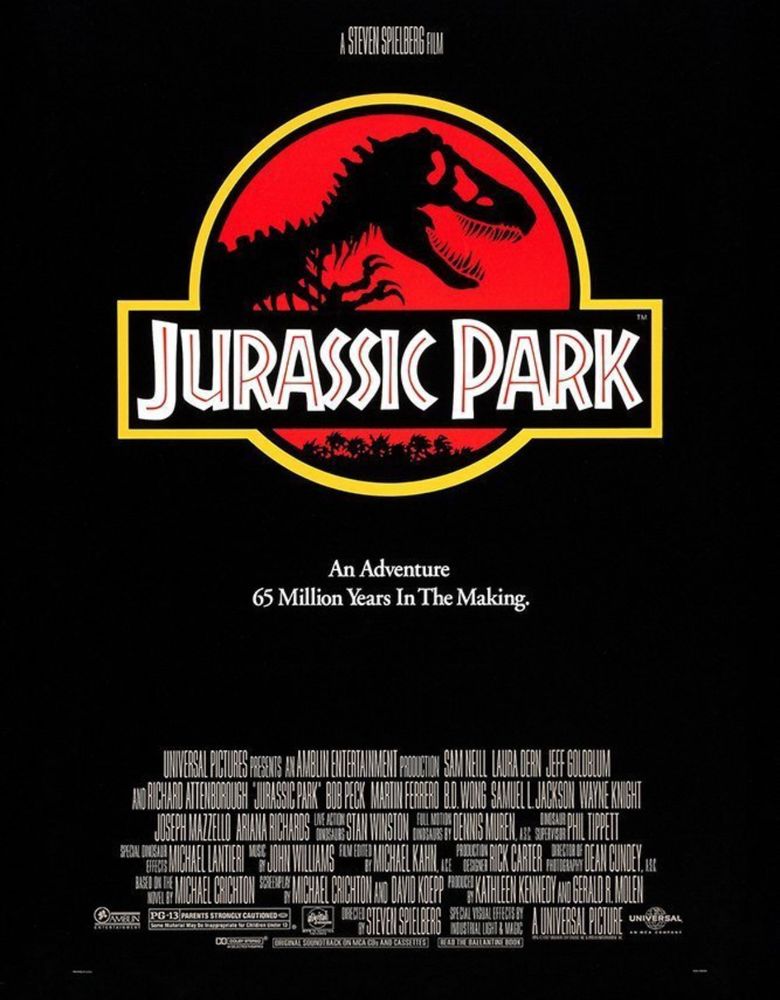 Jurassic Park movie poster. Big logo — T-Rex skeleton silhouette over the title text, black background, and illegible credit text. 
