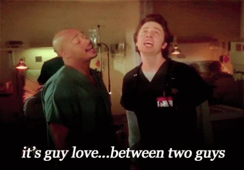 A GIF of JD and Turk from Scrubs, singing "It's guy love... between two guys"