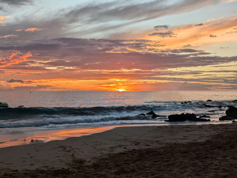 Beach sunset, orange with clouds. 