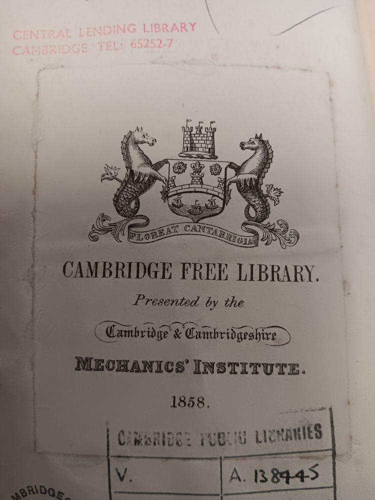 A paste in of a old library book. There's a line drawing of the Cambridge City crest and then underneath it says Cambridge Free Library Presented by the Cambridge & Cambridgeshire Machanics' Institute 1858
