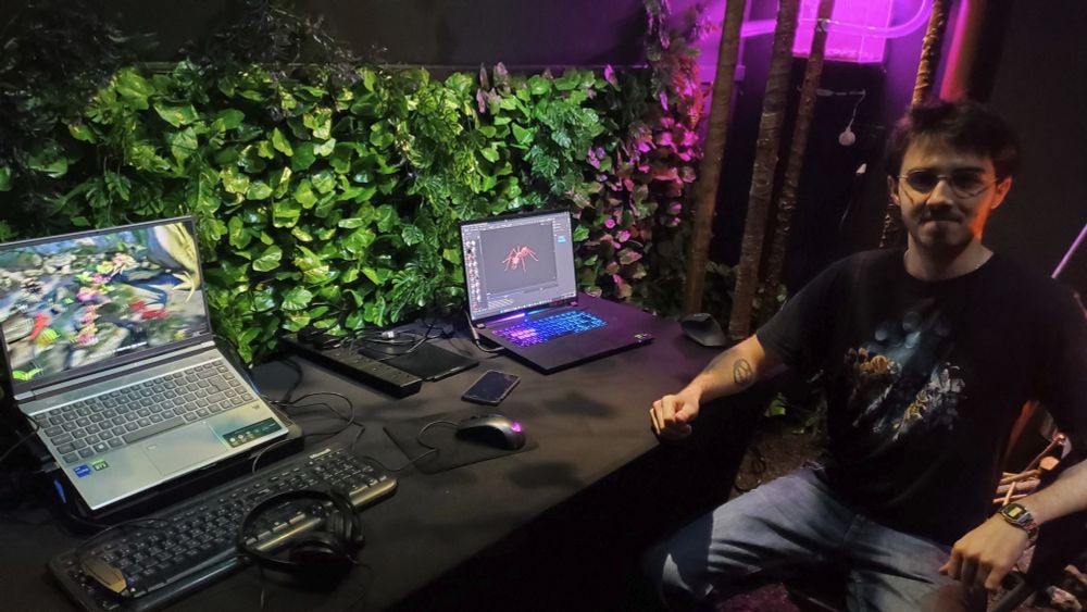 Jack (character artist) at an Empires of the Undergrowth booth at AntCon 2025