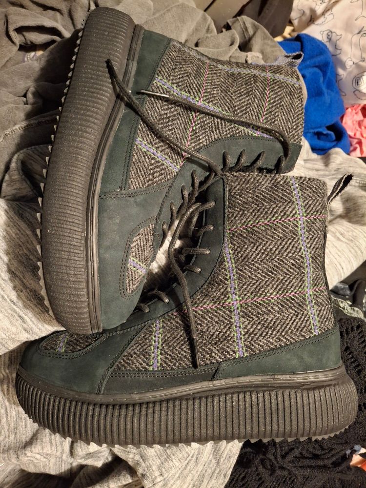 Black and multicolor high top sneakers made of tweed and suede w a bit of a platform and soles that are definitely glued on recently