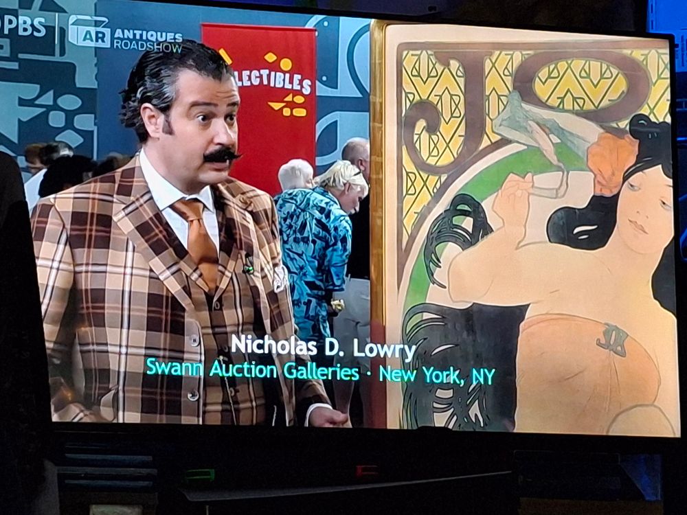 Nicholas d Lowry evaluating a mucha print in an Indianapolis episode of the antiques roadshow 