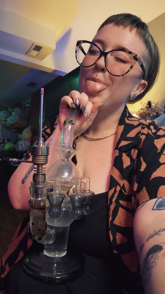 Beebs sticking her tongue out during a dab!