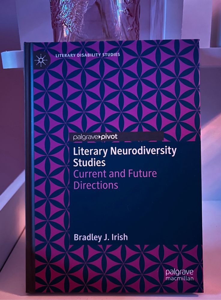 An image of the book “Literary Neurodiversity Studies: Current and Future Directions” by Bradley J. Irish in a soft pink/purple background.
