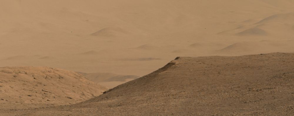 An ochre toned image capturing a Martian landscape