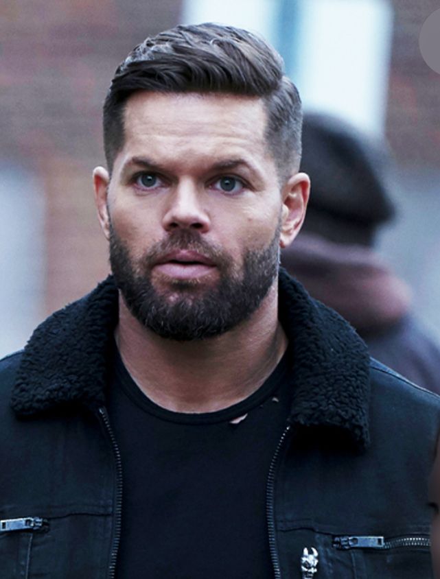 Actor Wes Chatham in character as Amos from The Expanse.