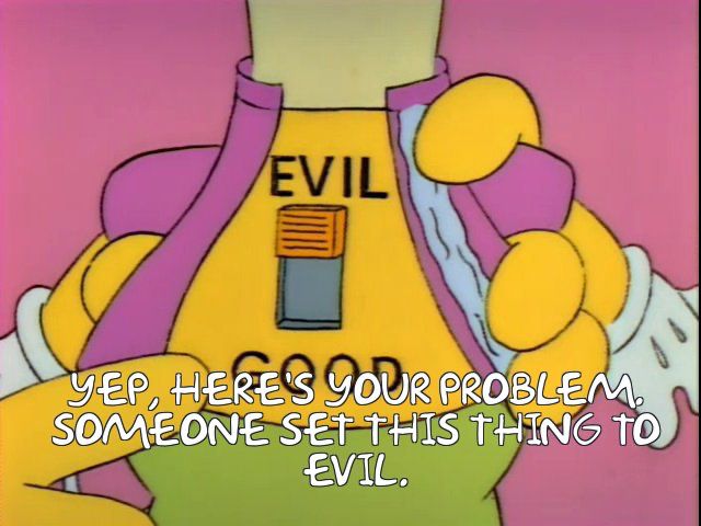 Guy on Simpsons looking at back of doll saying “yep, here’s your problem. Someone set this thing to evil.”