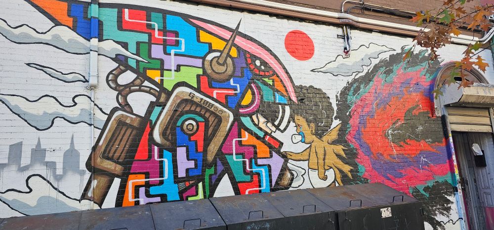 A graffiti image of what I'm taking as a father that lost their child into the void and is honoring them with this art piece. A jigsaw rainbow helmet is being touched by a baby with the void behind the baby.