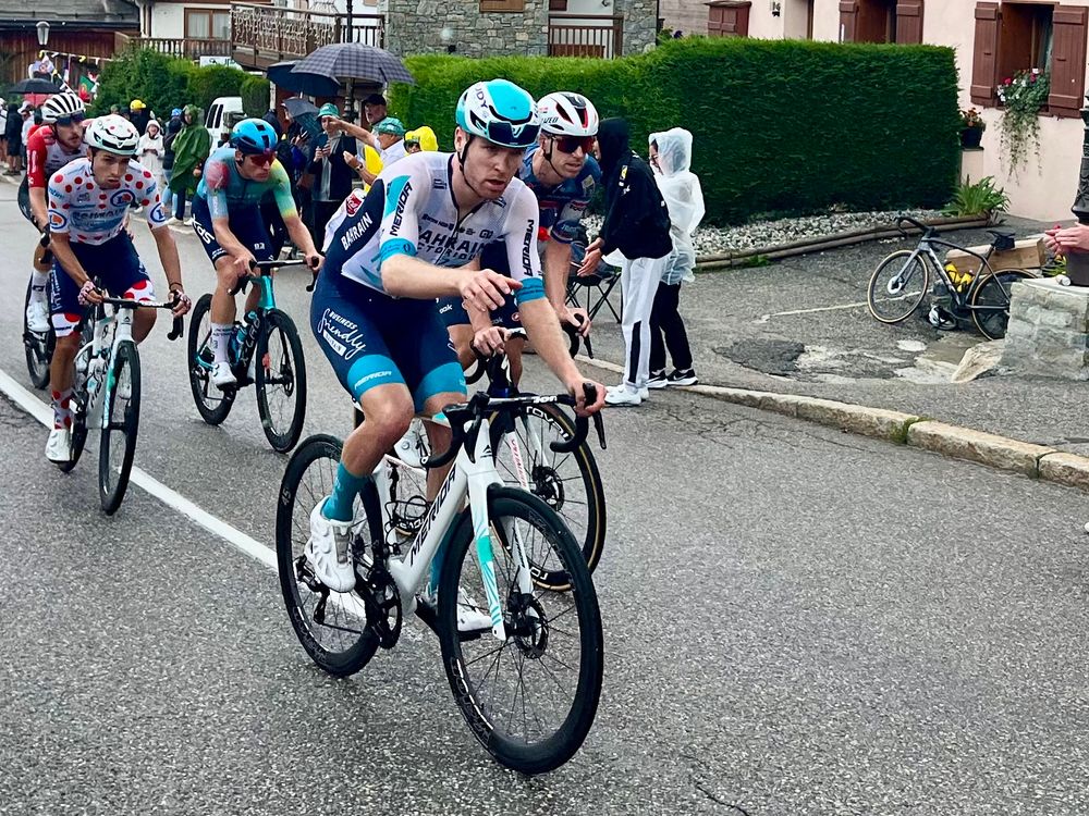 Riders on the tour making their way uphill 