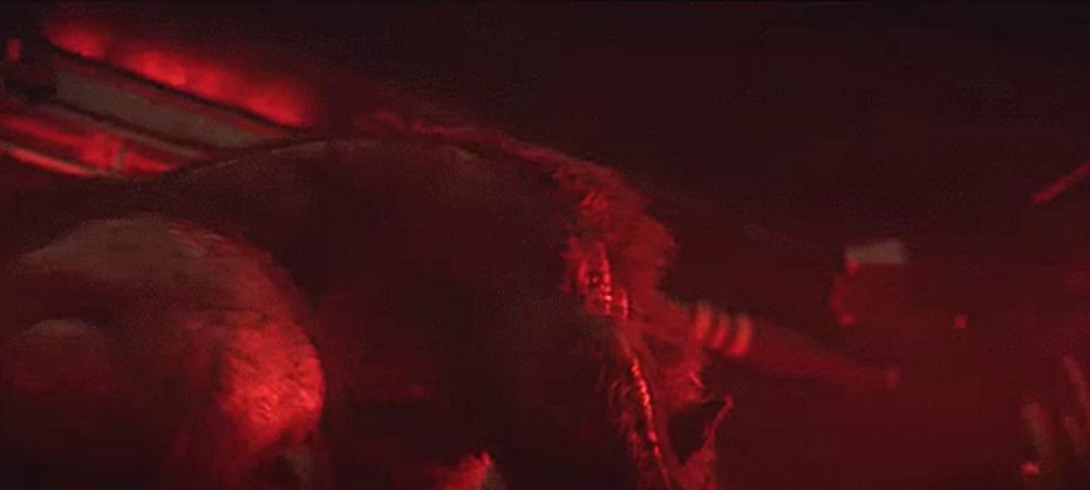 a close up of a werewolf with its mouth wide open