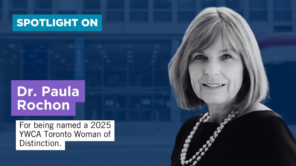 A digital graphic features a black-and-white portrait of Dr. Paula Rochon, a woman with shoulder-length hair, wearing a black top and a pearl necklace. The background is a blurred blue-tinted image of a modern building with large windows. At the top left, a blue banner reads "SPOTLIGHT ON" in white text. Below, a purple box displays "Dr. Paula Rochon" in bold white letters. A white text box underneath states, "For being named a 2025 YWCA Toronto Women of Distinction.