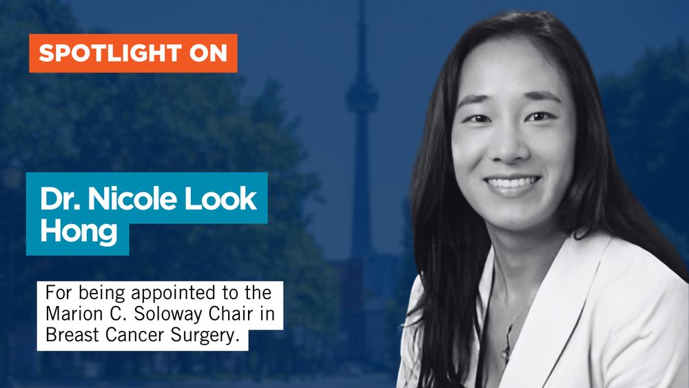  A professional headshot of Dr. Nicole Look Hong, a woman with long dark hair, smiling and wearing a white blazer. The background features a blue-tinted image of Toronto’s skyline, including the CN Tower. The text reads: "SPOTLIGHT ON Dr. Nicole Look Hong — For being appointed to the Marion C. Soloway Chair in Breast Cancer Surgery.