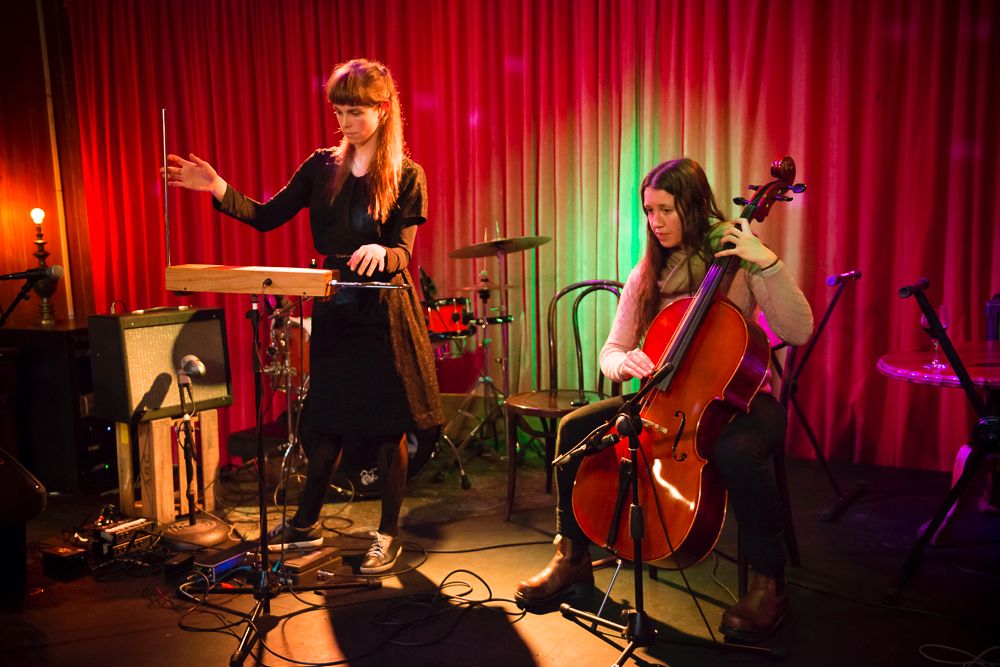 A woman (Nell Thomas), standing, plays theremin. A woman (Erika Grant), seated, plays cello.

Photo: Matt Evans
