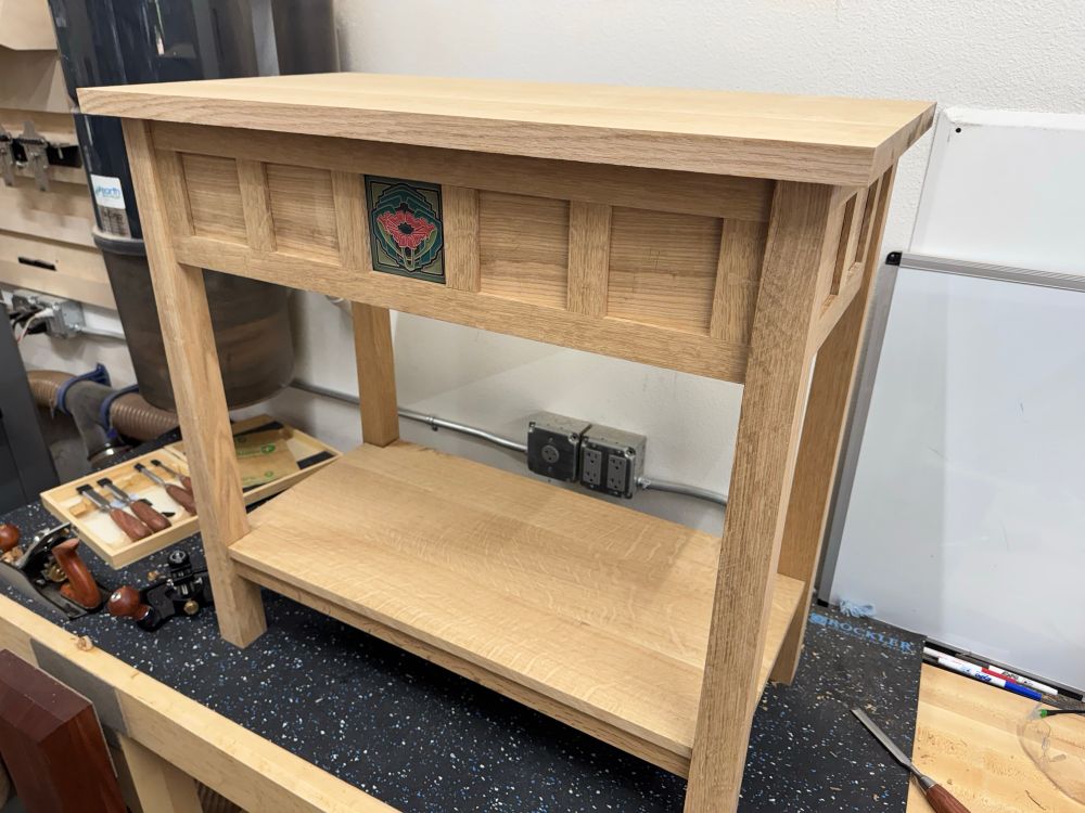 Console table made out of quartersawn white oak with a clay accent tile on the face. Dry assembly.