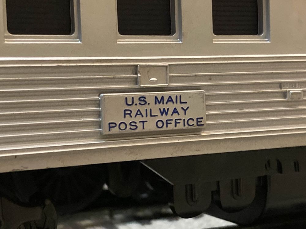 Another closeup, now with printed lettering on a plate. It reads "U.S. Mail" and "Railway Post Office" in blue.