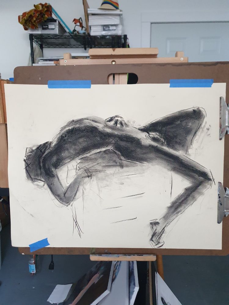 Charcoal study of male in an arc reclined pose. 