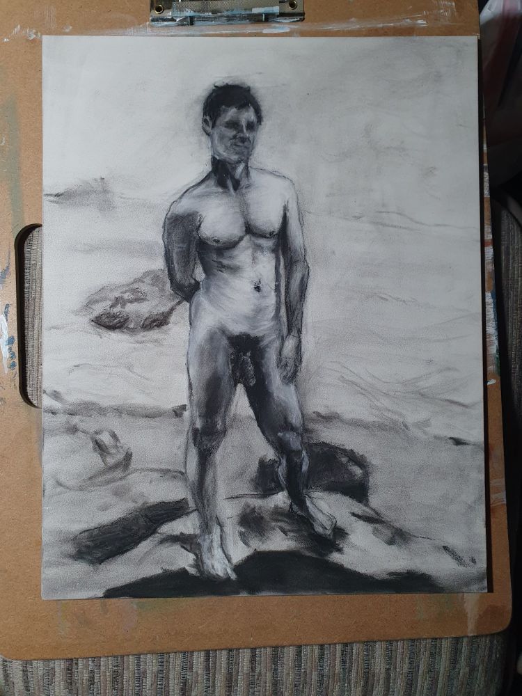 Male figure on rocks along San Francisco coast line.  Drawing done in charcoal.  WIP
