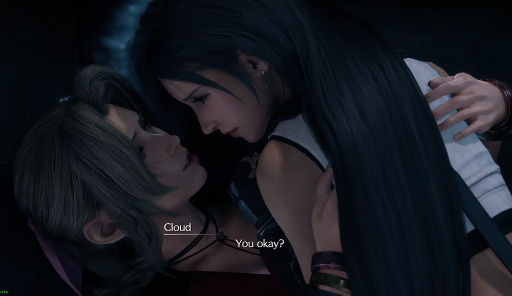 Aerith laying on the ground with Tifa on top of her, after they both jumped out of a train.  c: