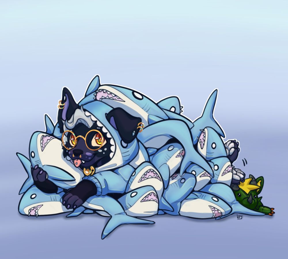 A pile of IKEA sharks, in the pile is a dog wearing a shark onesie hugging a shark. To the left of the pile is a little plushie of a small dragon hidden among the sharks
