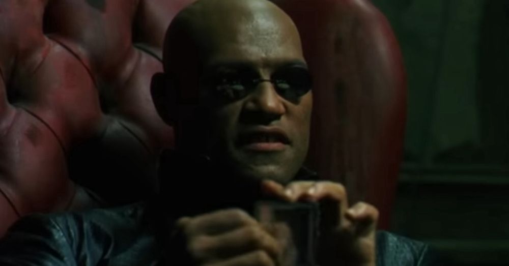 Morpheus sitting in his big red chair