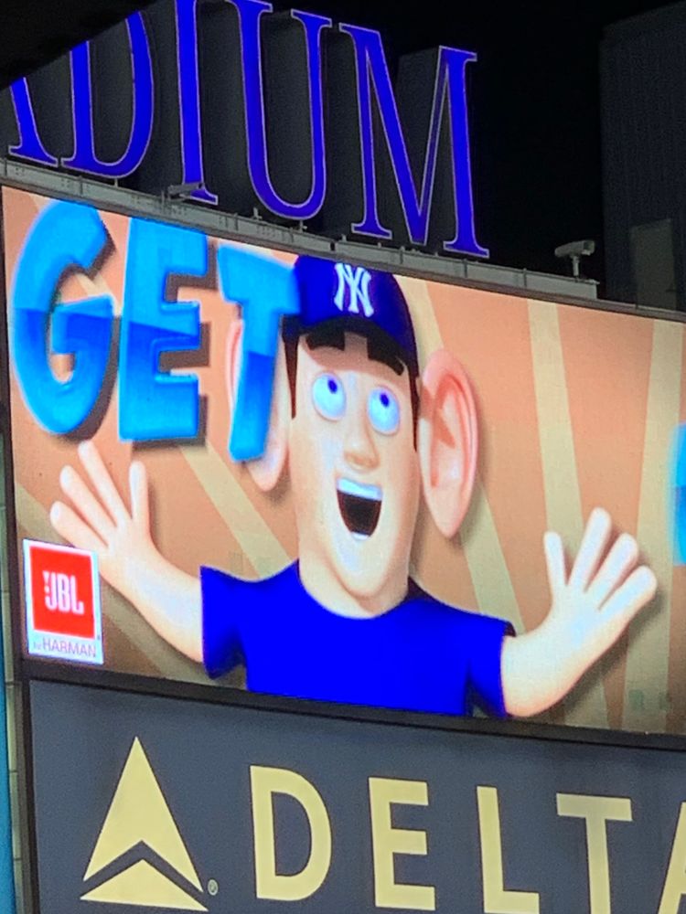 The horrible “GET LOUDER” guy on the jumbo screen at Yankee Stadium