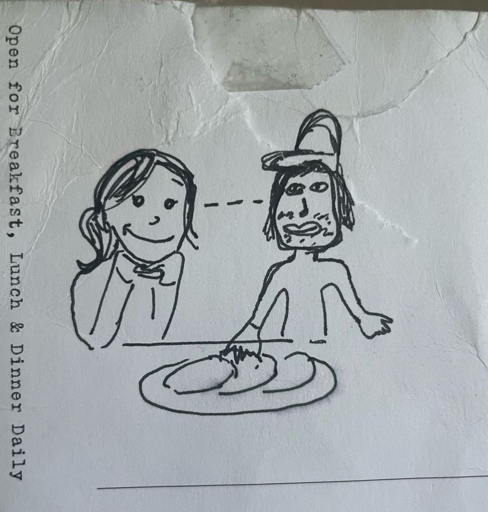 A drawing on a menu, two people looking sweetly at each other. One is drawn like a cute person the other is drawn the way a child might draw a werewolf 