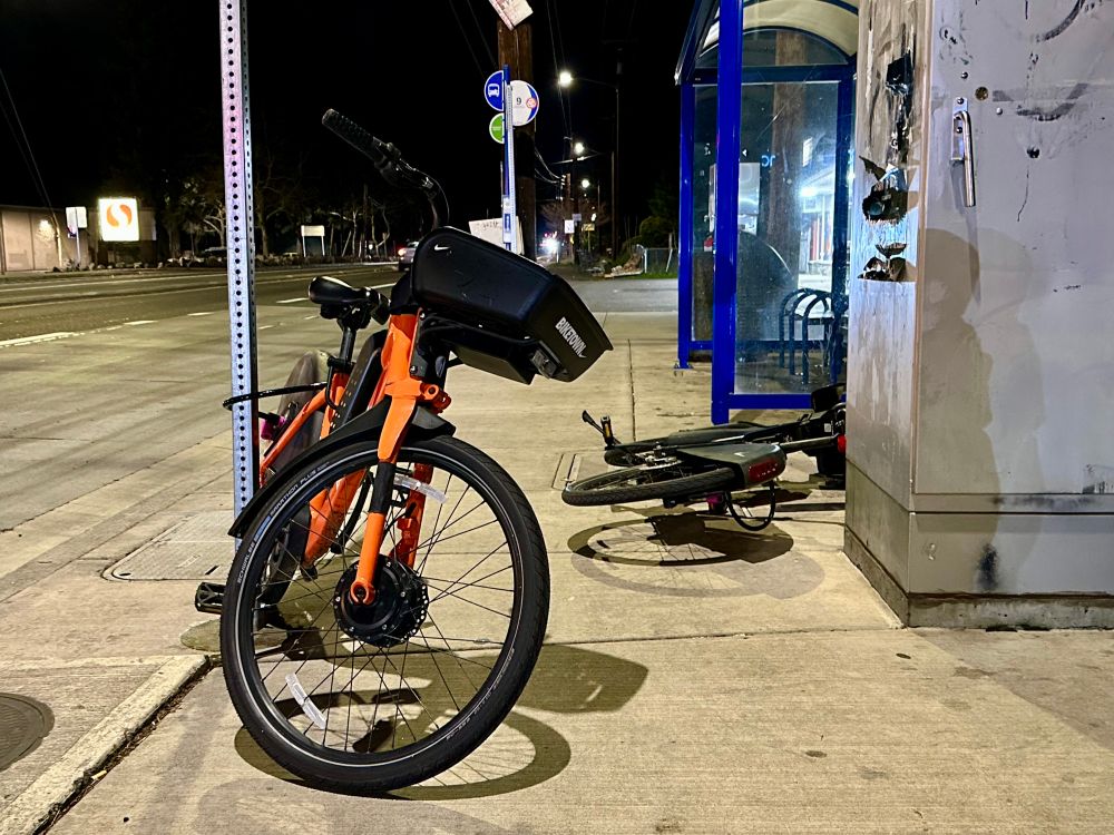 electric bikes on "sharing" network blocking a sidewalk