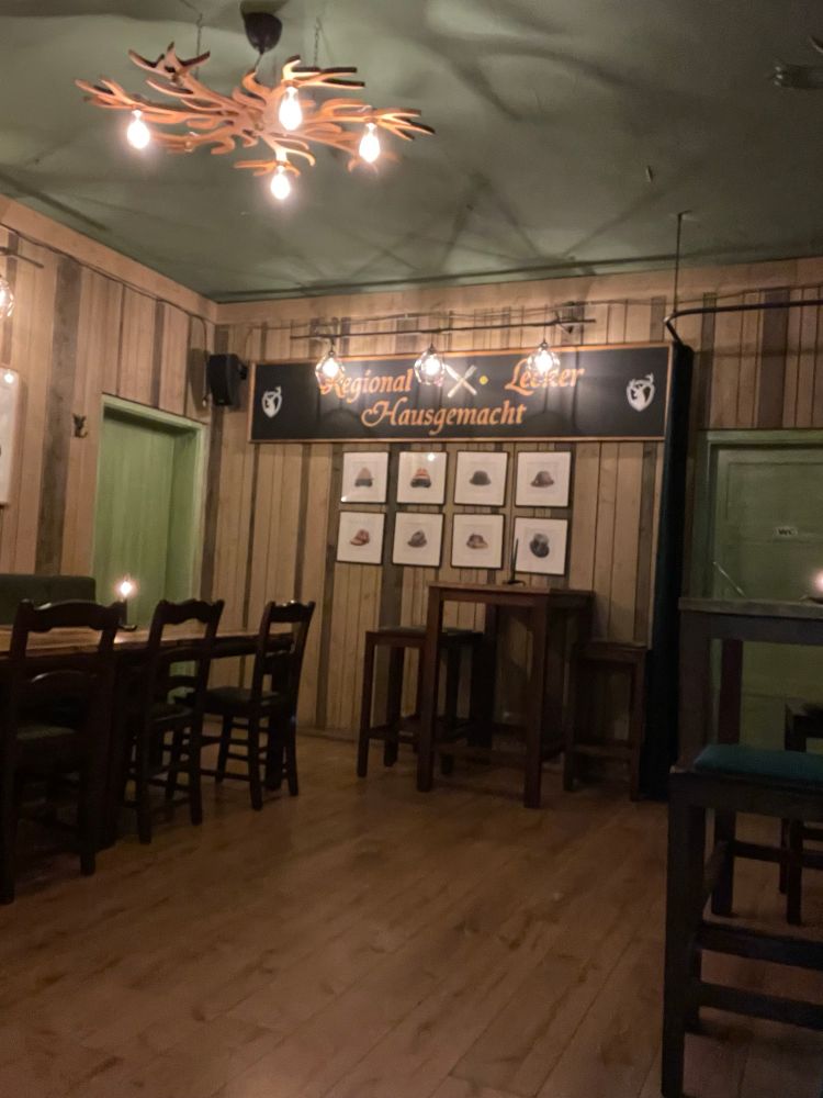 View towards the toilet from a bad table in an otherwise good restaurant 