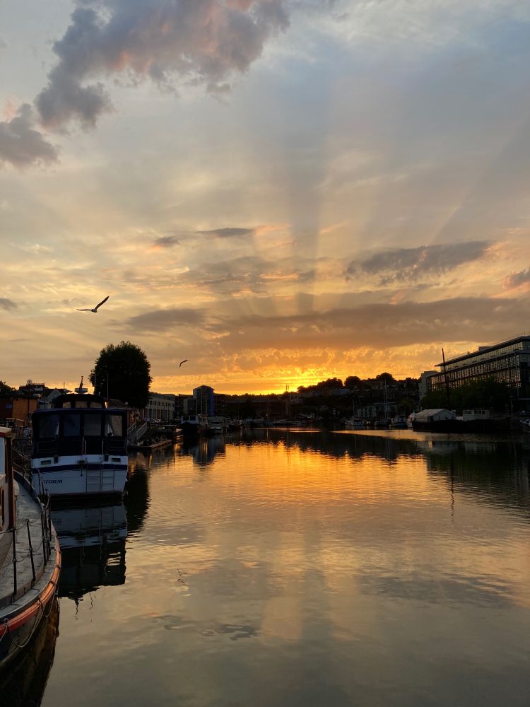 Here’s another Bristol Harbourside favourite! I love Bristol! You can see the boats along one side and a bird flying out of shot. The sunset is reflected on the water so the picture is bathed in a warm glow of orange.