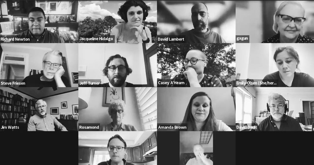 A black and white shot of 16 people talking on Zoom.