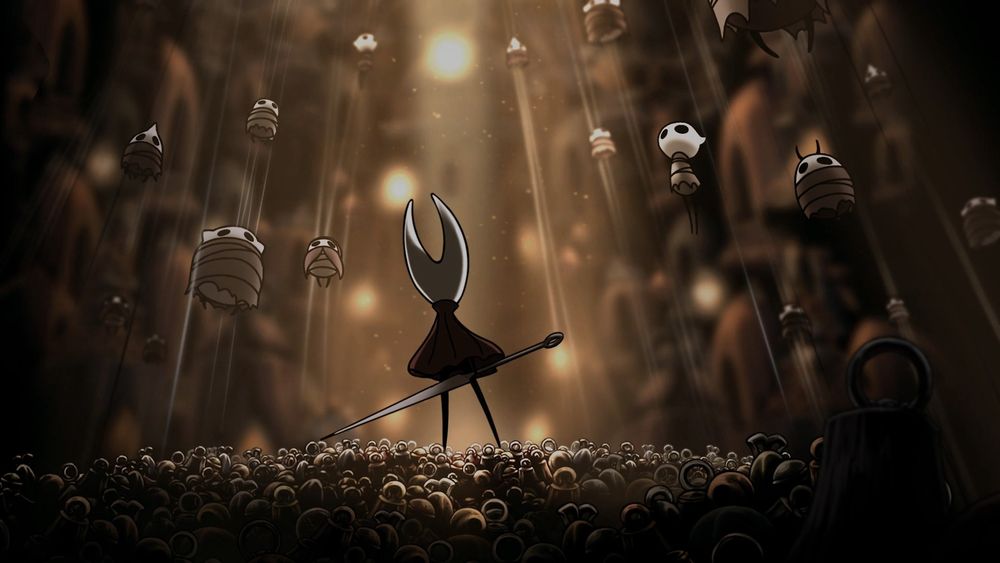 Captura de pantalla del videojuego Hollow Knight: Silksong, en la que se ve a Hornet de espaldas observando a un montón de bichos atrapados en una telaraña.