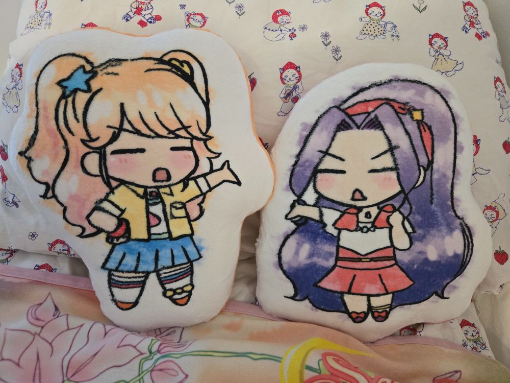 Two pillows of chibi-fied Mikuru and Mizuki from Aikatsu