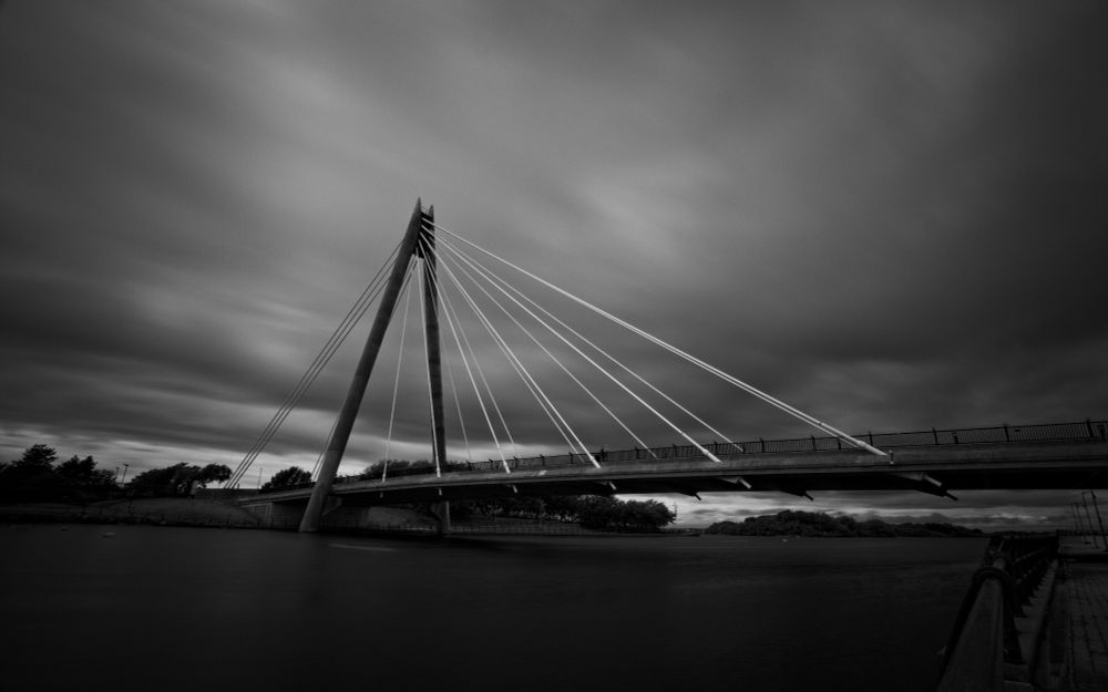 Southport marine bridge long exposure during heavy wind in black and white