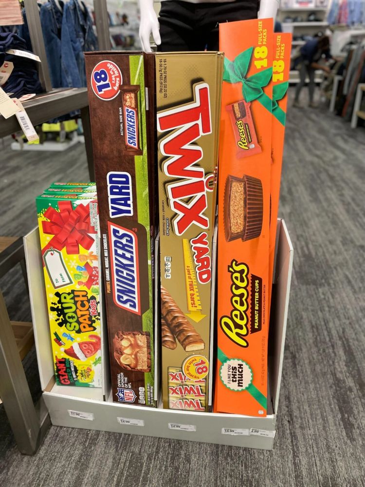 A display of three-foot-long snickers, twix, and reeses bars (and slightly less long, but equally impressive, sour patch kids boxes)
