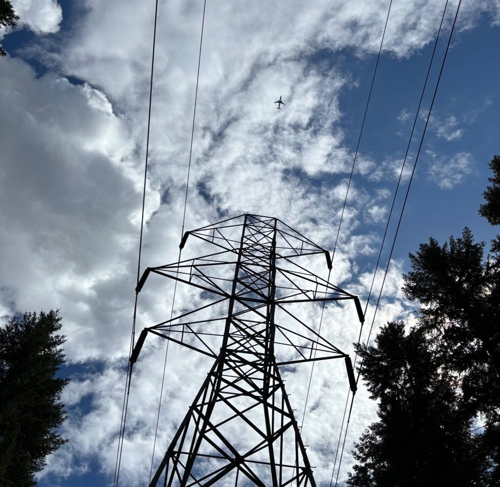 Jet above power lines 