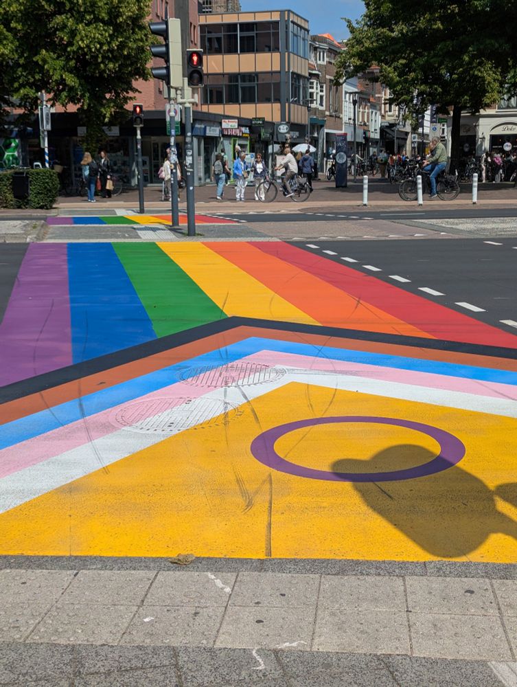 Crosswalk updated to resemble a large Progressive Pride flag