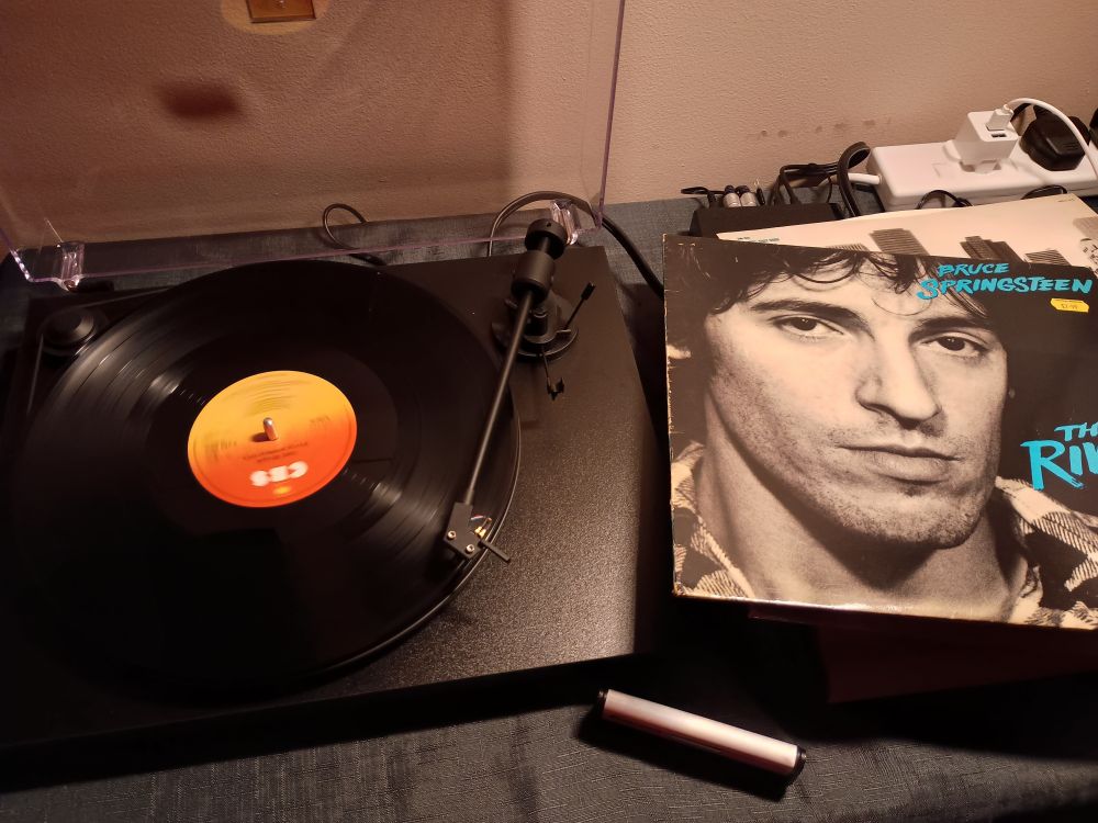 The River by Bruce Springsteen, spinning on my recently acquired LP ROM drive. I'm old enough now that I don't care what you think :).