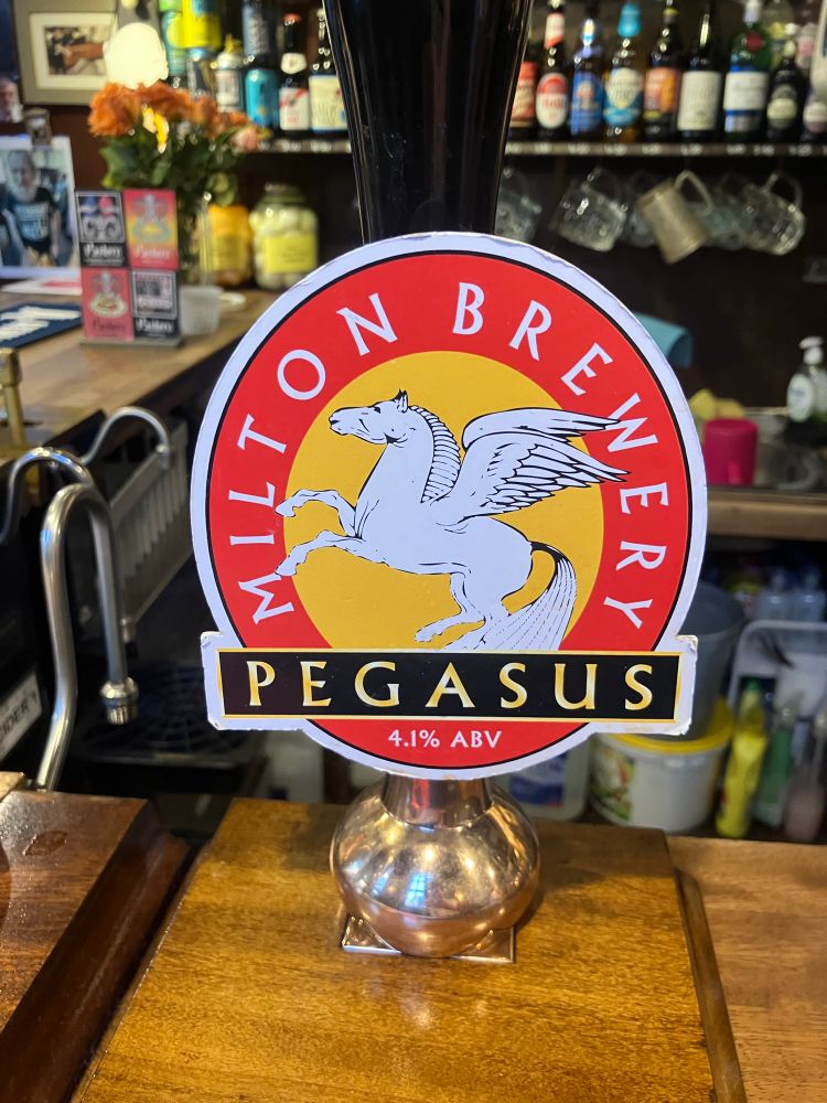 A pump clip for a beer called "Pegasus" from Milton brewery.