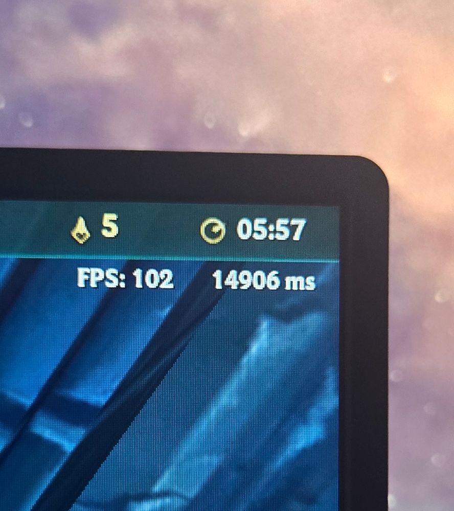A photo of a corner of a computer screen showing ping of 14906 ms