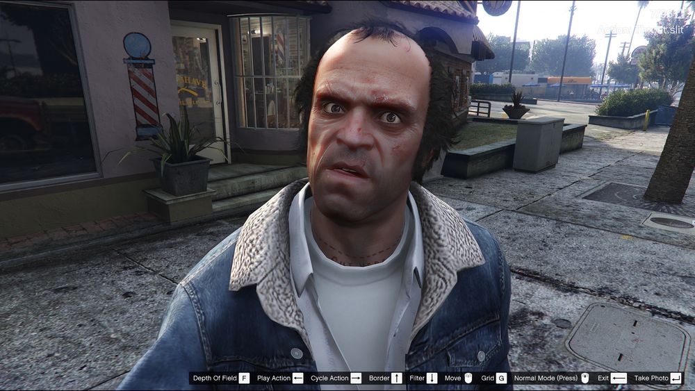 Trevor still licking his teeth while looking at you 