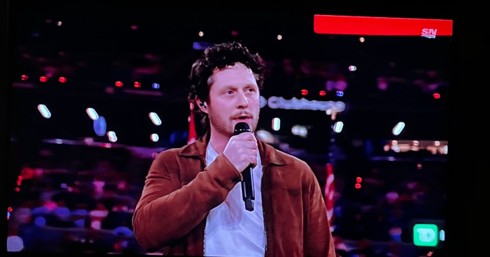 Noah Reid singing the Canadian National Anthem 