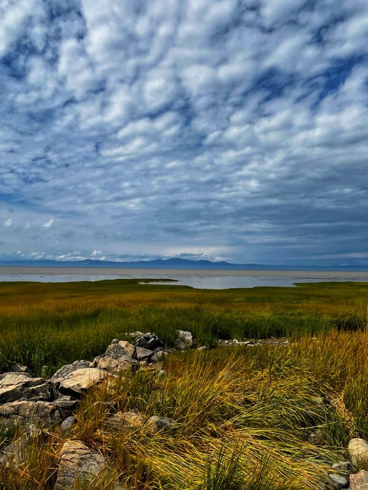 Aug 29/25. Mountains of Québec seen across the shoreline.