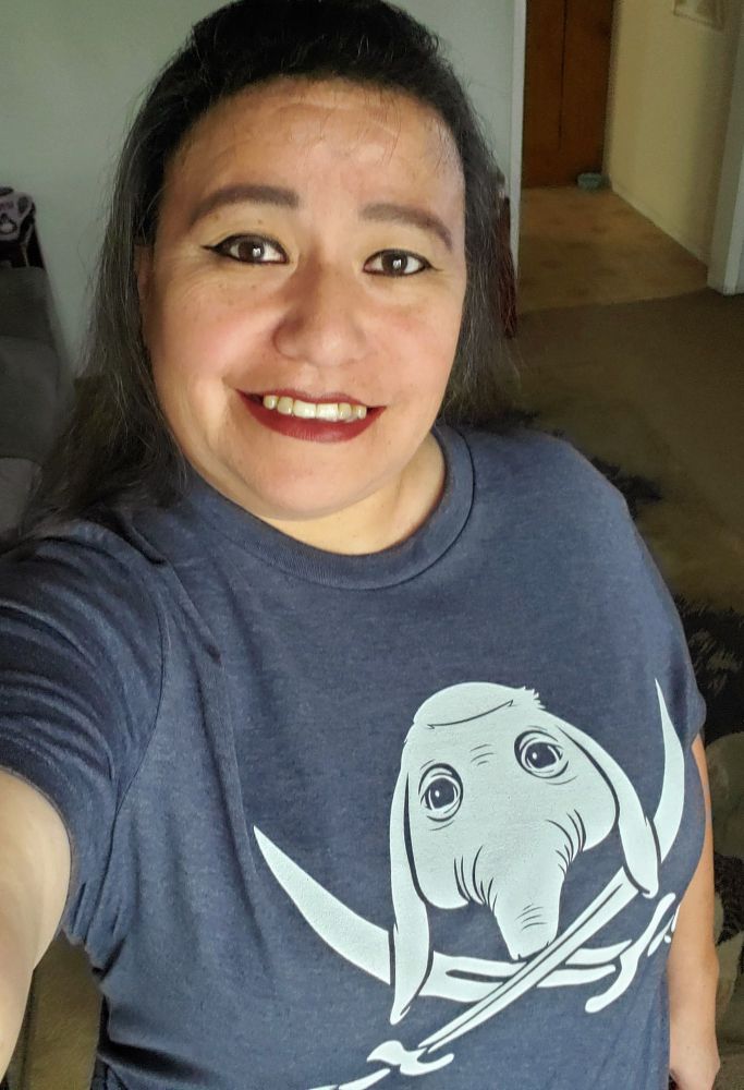 Me wearing my blue space pirate Neel shirt. 