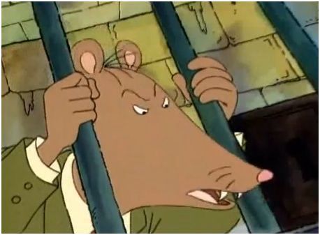 mr. ratburn from arthur grasping the bars of a cell and baring two fangs with an angry expression on his face